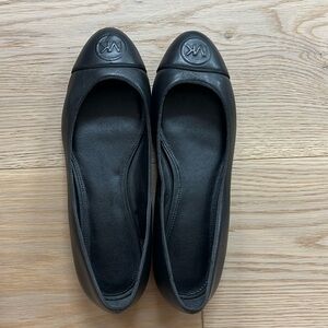 Black leather Michael Kors flats